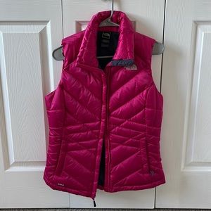 The North Face pink puffer vest in perfect condition